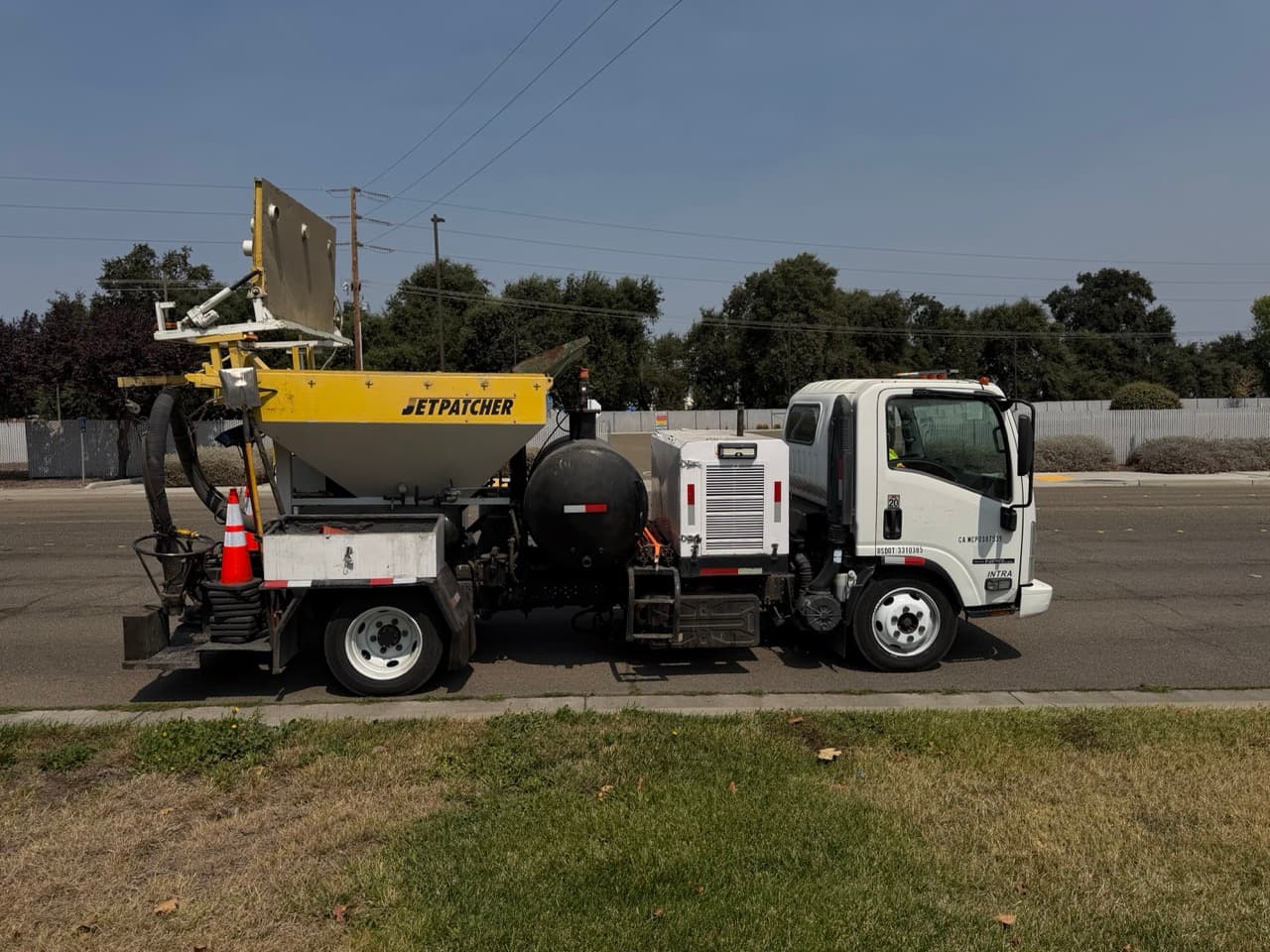 Machine operating on a clean street